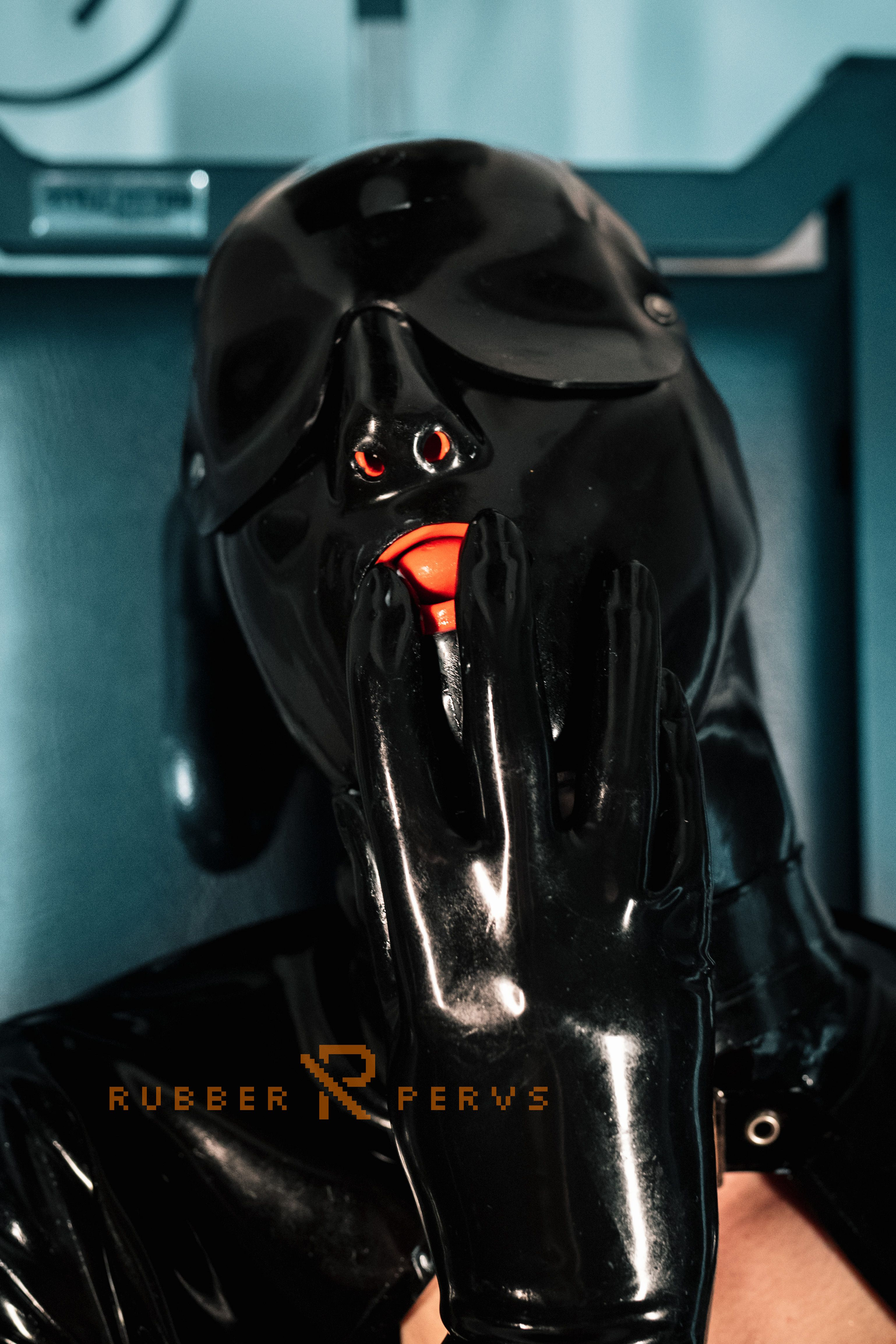 Photo number 15 from Rubberslut with Heavy Rubber Helmet fucking her pussy on slave chair shot for Rubber Pervs on Kink.com. Featuring Rubber in hardcore BDSM & Fetish porn.