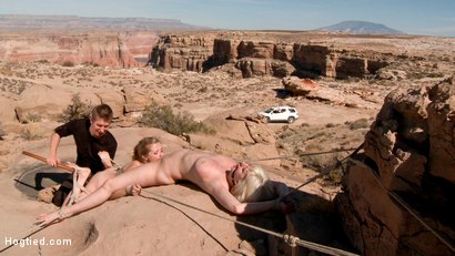 Photo number 8 from FEATURE SHOOT : WET ROCK CANYON shot for Hogtied on Kink.com. Featuring Danny Wylde, Penny Pax and Cherry Torn in hardcore BDSM & Fetish porn.